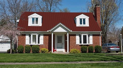 burgundy metal roof on red brick house|red metal roofing.